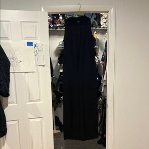 Athleta Black Jumpsuit. Mock neck with zip. Wide leg pants with cargo pockets.